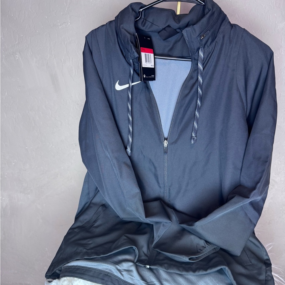 Women’s Nike Dri-Fit Charcoal Full-Zip Jacket with adjustable hoodie